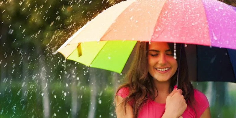 Rain falling on a covered outdoor event space