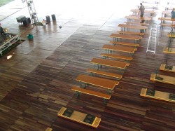 Beer hall tables and tongue in groove hardwood flooring